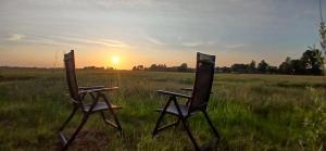 Východ nebo západ slunce při pohledu z luxury tent nebo okolí
