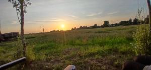 Východ nebo západ slunce při pohledu z luxury tent nebo okolí