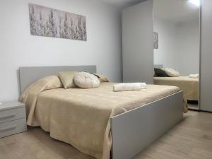 Postel nebo postele na pokoji v ubytování Dietro la Matrice