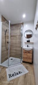 a bathroom with a shower and a sink at Zielona Dolina in Łagów +19 photos