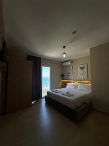 Voodi või voodid majutusasutuse CoastAL Hotel Shengjin toas