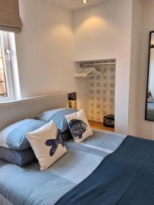 Postel nebo postele na pokoji v ubytování Appartement Havenzicht