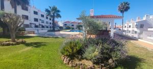 a view of the courtyard of a apartment building at Albufeira New House in Albufeira