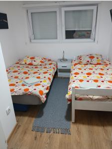 Letto o letti in una camera di HOLIDDAY HOUSE THE LUx