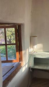 Ένα ή περισσότερα κρεβάτια σε δωμάτιο στο Ecoespacio Runachay