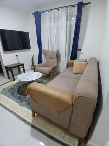 Foto dalla galleria di Residence Next Door Gz a Kiambu Altre 36 foto