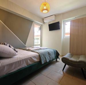 Postel nebo postele na pokoji v ubytování Nava Apartments
