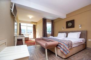 Postel nebo postele na pokoji v ubytování New Hotel Kuč By Marvel