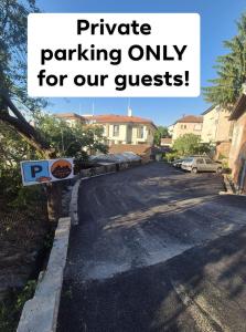 a street with a parking only for our guests at Къща за гости Белоградчик in Belogradchik