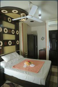 Postel nebo postele na pokoji v ubytování El Massa + 6 fotografií