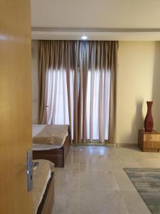 Postel nebo postele na pokoji v ubytování Lilyland Resort&water park