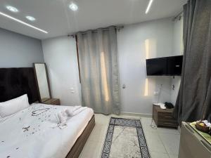 Voodi või voodid majutusasutuse AL krma pyramids hotel toas
