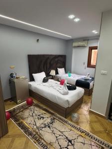 Voodi või voodid majutusasutuse AL krma pyramids hotel toas