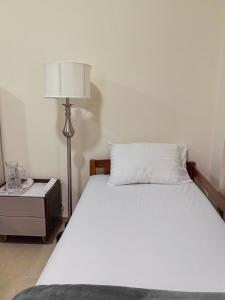 Postel nebo postele na pokoji v ubytování Ahlan New Horizon JBR