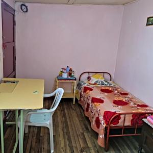 Postel nebo postele na pokoji v ubytování Conexión Urbana en el centro de Ambato