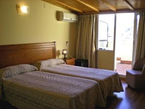 A bed or beds in a room at Labella María Még 37 kép