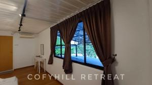 Fotografie z fotogalerie ubytování CofyHill Retreat v destinaci Kampong Changkat Tualang