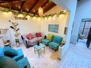 Predel za sedenje v nastanitvi Blomst Casa Hostal