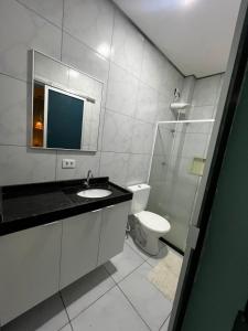 Et badeværelse på Flat Outono Aconchegante 2