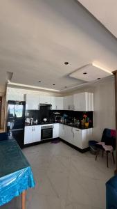 Η κουζίνα ή μικρή κουζίνα στο Appartement Mehdia