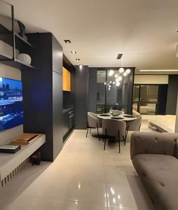 Et tv og/eller underholdning på Studio Boeing - Luxo e Conforto