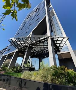 Bygningen som lejligheden ligger i + 3 billeder