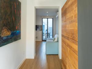 TV a/nebo společenská místnost v ubytování Stylish terraced house near the sea