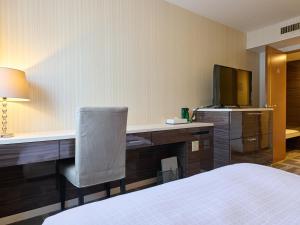 Postel nebo postele na pokoji v ubytování ORDA HOTEL