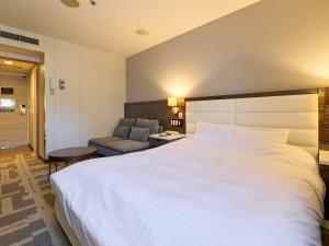 Postel nebo postele na pokoji v ubytování ORDA HOTEL