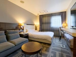 Postel nebo postele na pokoji v ubytování ORDA HOTEL
