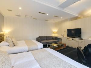 TV a/nebo společenská místnost v ubytování ORDA HOTEL