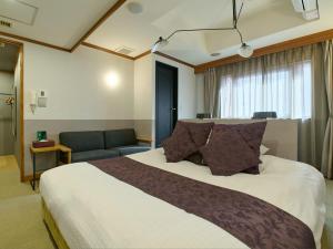 Postel nebo postele na pokoji v ubytování ORDA HOTEL