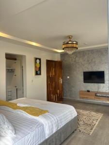 Postel nebo postele na pokoji v ubytování 5th avenue apartment + 7 fotografií