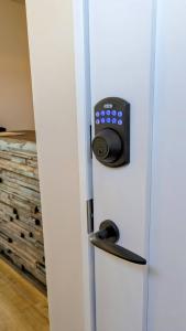a door with a safe on the side of it at Hotel134 鎌倉 in Kamakura +12 photos