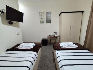 Katil atau katil-katil dalam bilik di Chill Out Hotel