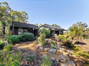 a house in the bush with a garden at Wildflower Ridge in Yallingup