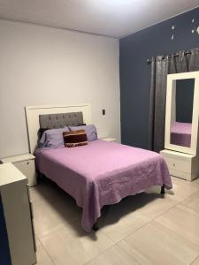 Ένα ή περισσότερα κρεβάτια σε δωμάτιο στο Casa sonora +5 φωτογραφίες