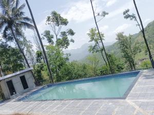 KanthalloorBeautiful Cottage with Swimming Pool At Kanthalloor的相册照片