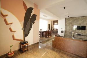 Μια τηλεόραση ή/και κέντρο ψυχαγωγίας στο Miami - Private Jaccuzzi Villa in Bangalore