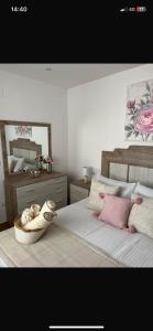 a bedroom with a bed with a bowl on it at Encarnita Apartamento - Monachil in Monachil