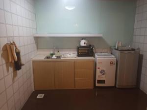 Η κουζίνα ή μικρή κουζίνα στο Seaview Regency Hotel PD 3R2B