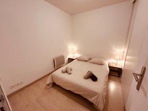 Postel nebo postele na pokoji v ubytování Albuconis 2 Appartement 1 chambre