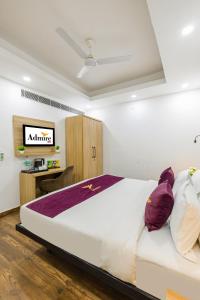 Postel nebo postele na pokoji v ubytování Hotel Admire Inn Sector 104