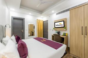 Postel nebo postele na pokoji v ubytování Hotel Admire Inn Sector 104