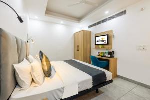 Postel nebo postele na pokoji v ubytování Hotel Admire Inn Sector 104