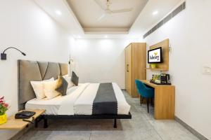 TV a/nebo společenská místnost v ubytování Hotel Admire Inn Sector 104