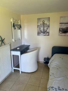 Postel nebo postele na pokoji v ubytování Tiny Comfort House