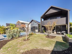 a contemporary house with a black facade at Space+Light lounge by pool walk to town beach in Dunsborough