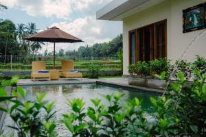 Κήπος έξω από το Verde House Ubud