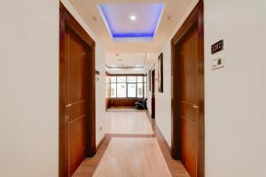 Ένα ή περισσότερα κρεβάτια σε δωμάτιο στο Townhouse Pondicherry Opposite to Rock Beach